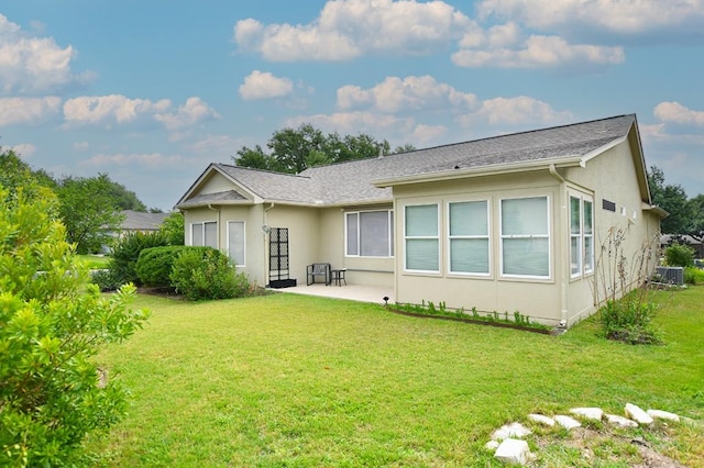 116 Dandelion Dr, Georgetown, TX 78633 - rear view of house with a patio, stucco siding, and a yard