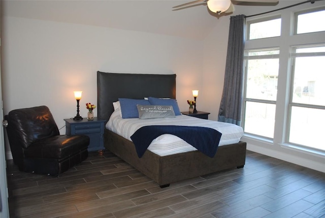 bedroom featuring ceiling fan and wood finish floors