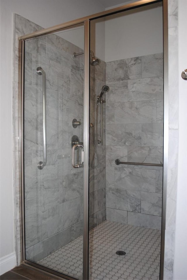 full bathroom with a stall shower