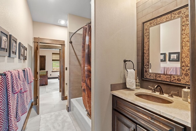 full bathroom with shower / tub combo with curtain and vanity