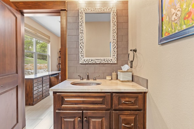 bathroom featuring backsplash and vanity