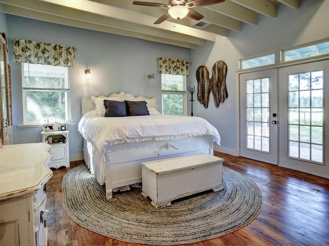 bedroom featuring visible vents, multiple windows, beam ceiling, and access to exterior
