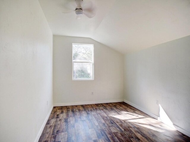 bonus room with baseboards, a ceiling fan, lofted ceiling, and wood finished floors