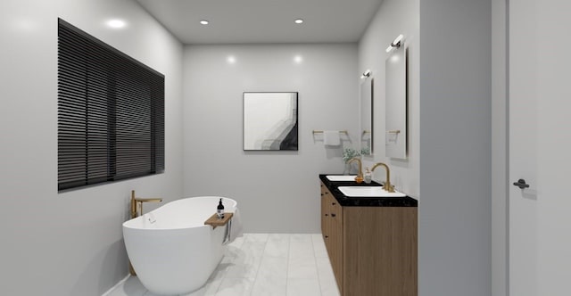 full bath featuring vanity, a soaking tub, and recessed lighting