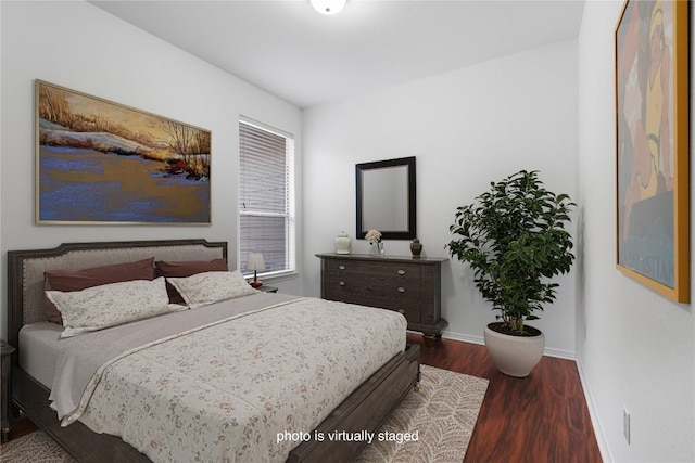 14100 Avery Ranch Blvd Unit 1402, Austin, TX 78717 - bedroom with wood finished floors and baseboards