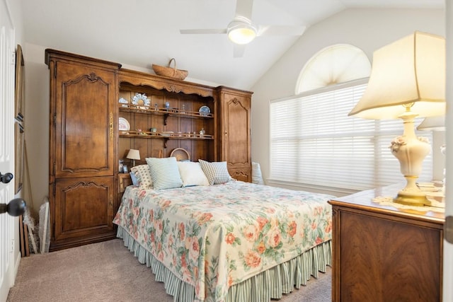 20531 Highland Lake Dr, Lago Vista, TX 78645 - bedroom featuring lofted ceiling, light carpet, and a ceiling fan
