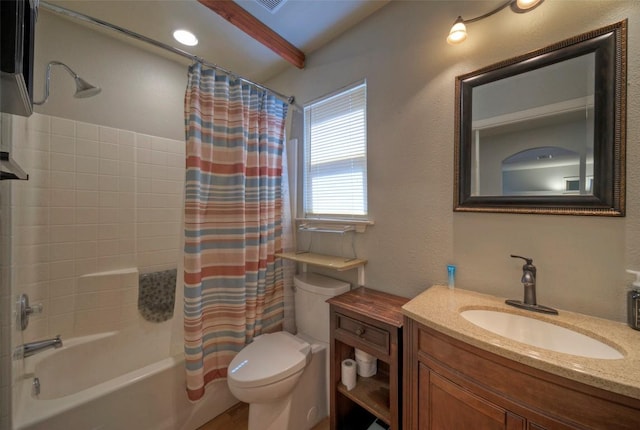 full bath with toilet, vanity, and shower / bath combo