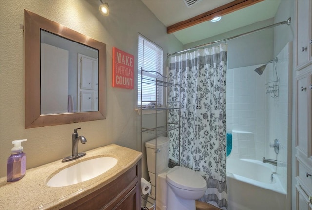 bathroom featuring beamed ceiling, visible vents, toilet, shower / bath combo, and vanity