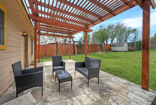 view of patio / terrace featuring an outdoor structure, a storage unit, a fenced backyard, and an outdoor living space