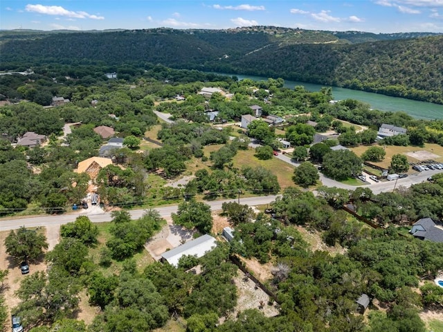 aerial view with a view of trees and a water view