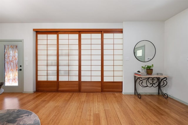 sitting room featuring light wood-type flooring