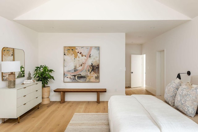 bedroom with light wood finished floors