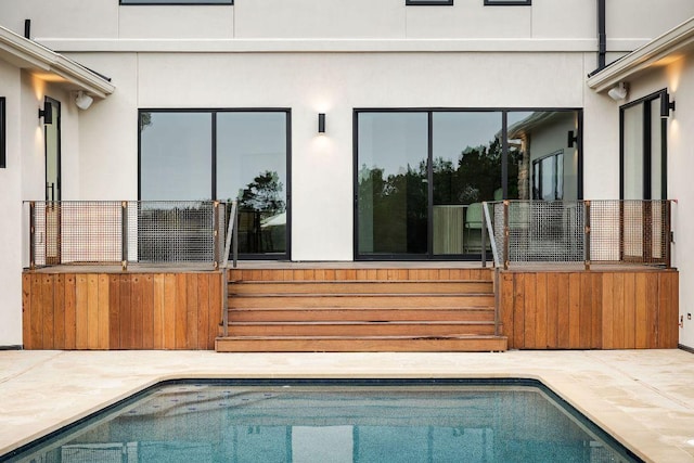 outdoor pool with a patio