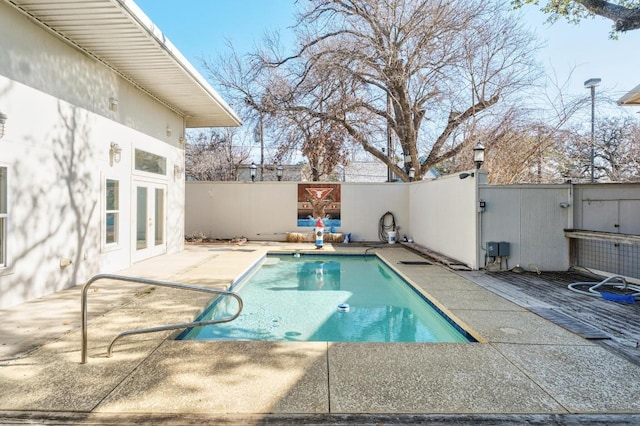 121 Scott St, San Marcos, TX 78666 - view of pool featuring a patio, fence, a fenced in pool, and french doors