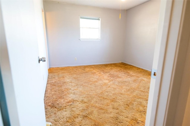 unfurnished room featuring carpet floors