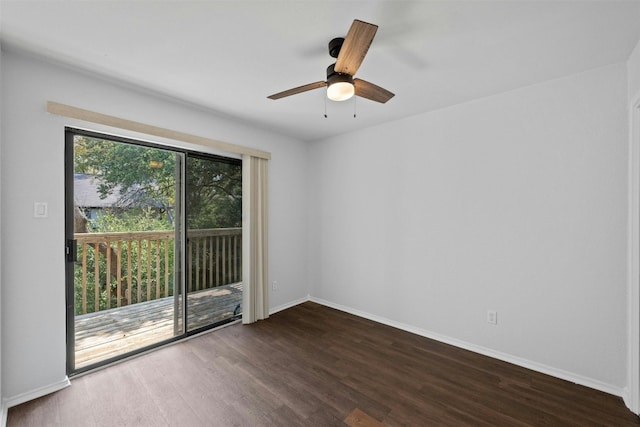 empty room featuring ceiling fan, baseboards, and dark wood finished floors