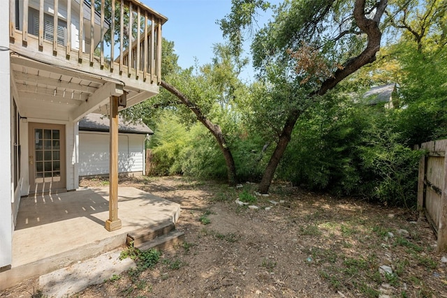 view of yard with a patio area and fence