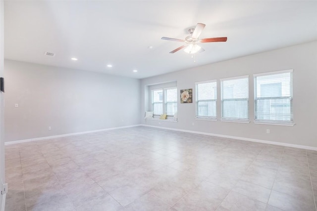 unfurnished room with recessed lighting, visible vents, baseboards, and a ceiling fan