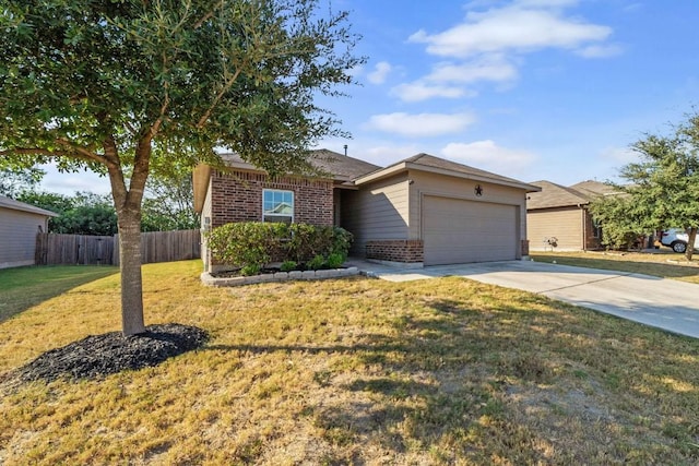 view of front of house featuring brick siding, an attached garage, driveway, and fence