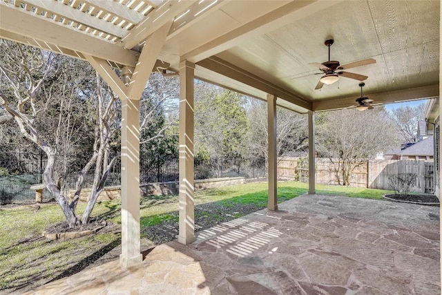 view of patio / terrace with a fenced backyard and a ceiling fan