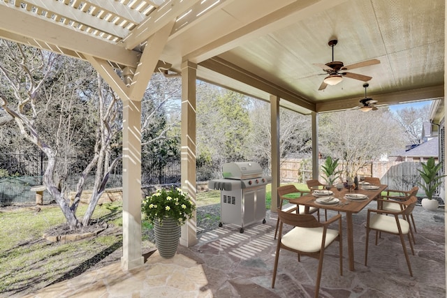 view of patio / terrace with area for grilling, a ceiling fan, a pergola, fence, and outdoor dining area