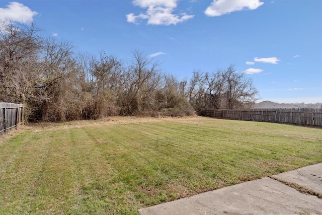 view of yard with fence