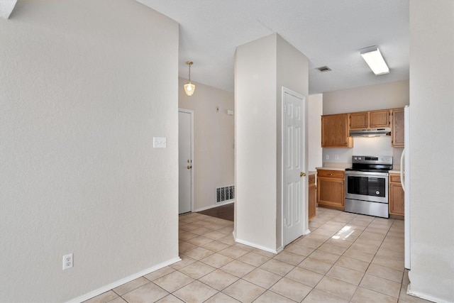 kitchen with under cabinet range hood, visible vents, stainless steel electric range, and light countertops