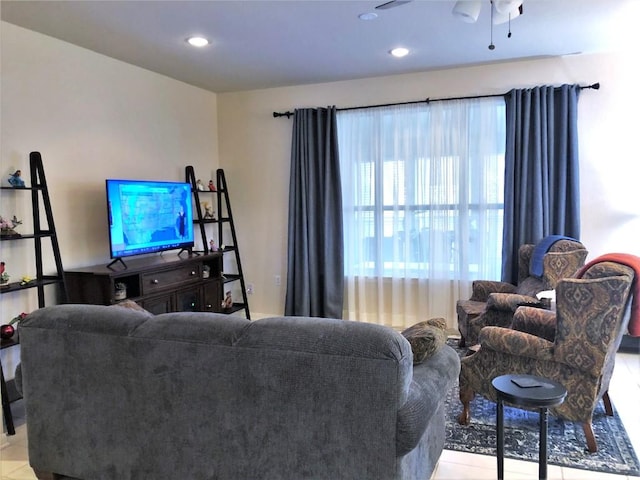 living room with recessed lighting and a ceiling fan