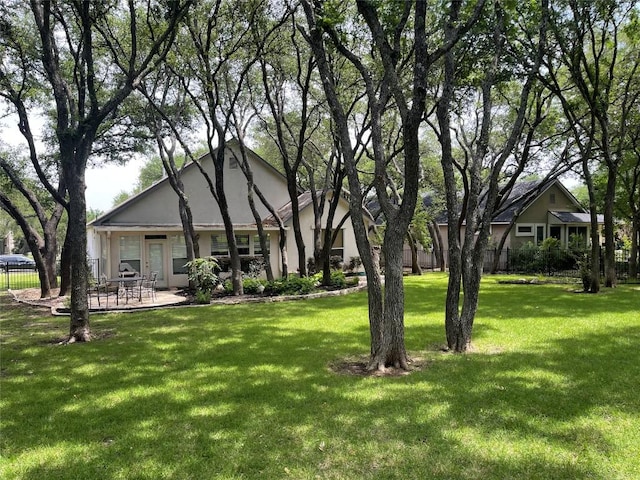 292 Whispering Wind Dr, Georgetown, TX 78633 - back of house with stucco siding and a patio