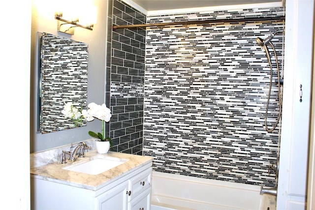 bathroom with shower / washtub combination and vanity