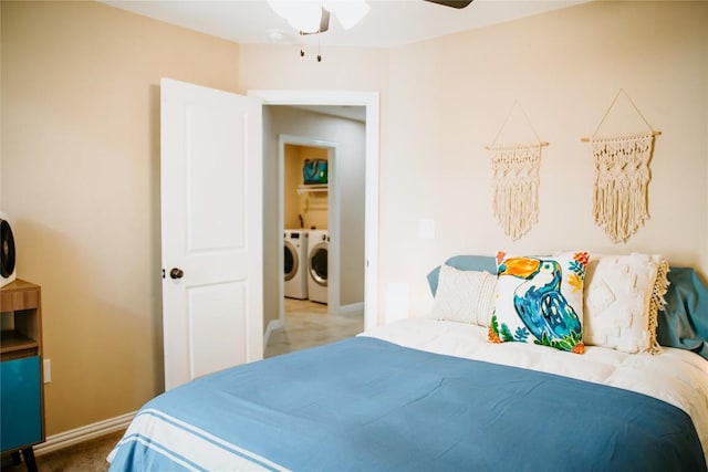 bedroom with washer and clothes dryer and baseboards