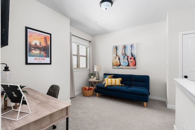 office area featuring carpet and baseboards