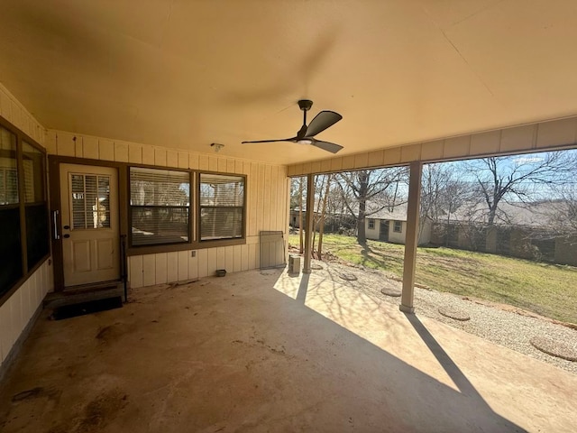 view of patio featuring ceiling fan