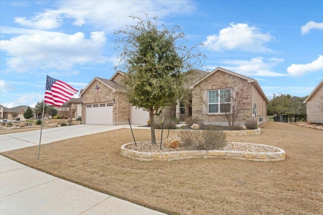 view of front facade with a garage, brick siding, concrete driveway, and a front lawn