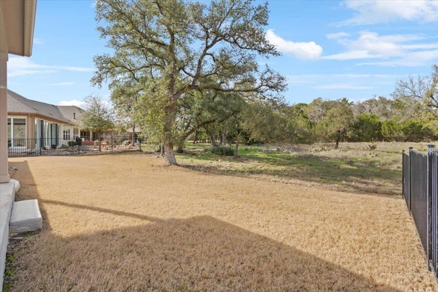 view of yard with fence