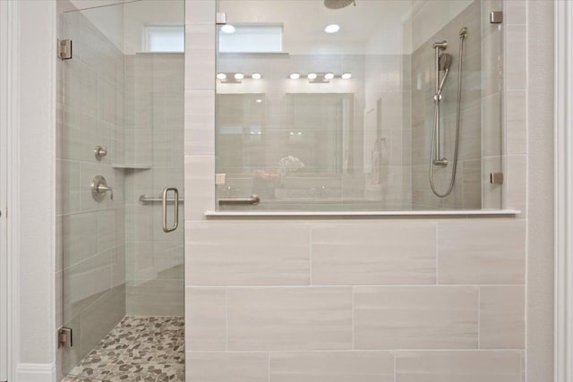 bathroom featuring a stall shower