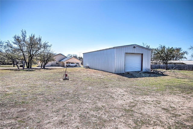 detached garage with fence