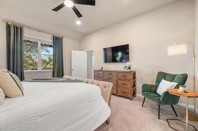 bedroom with a ceiling fan, visible vents, baseboards, vaulted ceiling, and light colored carpet