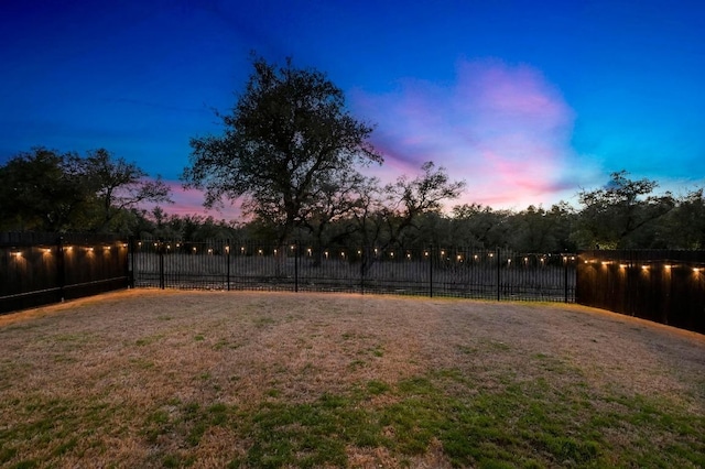 yard at dusk with fence