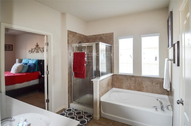 full bathroom with vanity, a stall shower, ensuite bathroom, and a bath