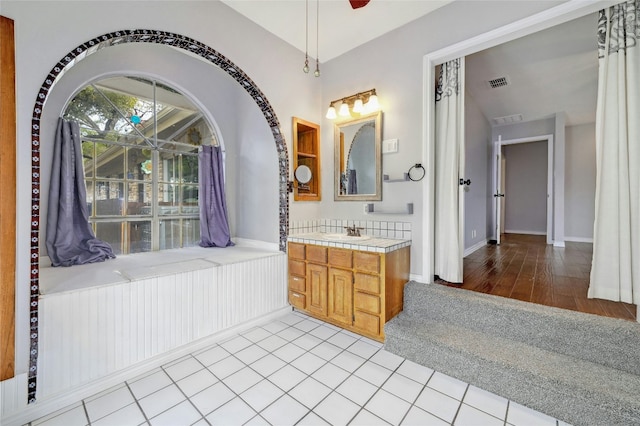 bathroom featuring visible vents and vanity