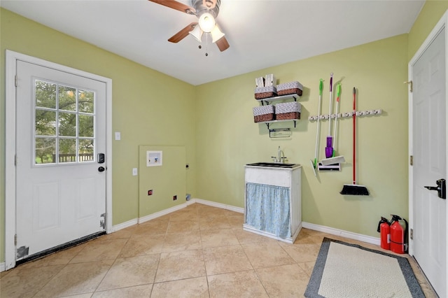 laundry room with light tile patterned floors, baseboards, hookup for an electric dryer, laundry area, and ceiling fan