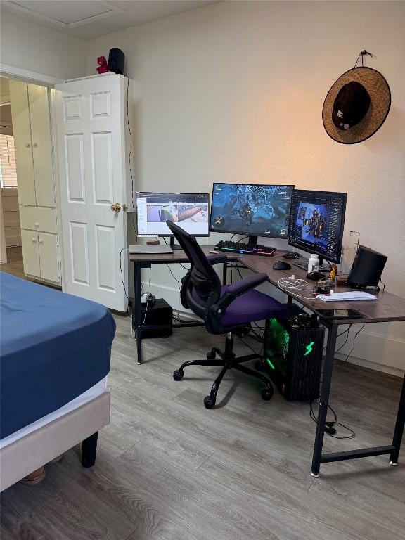 bedroom with wood finished floors