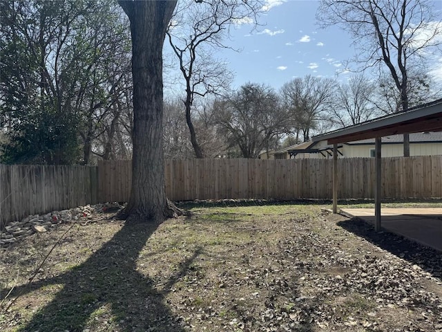 view of yard featuring a fenced backyard