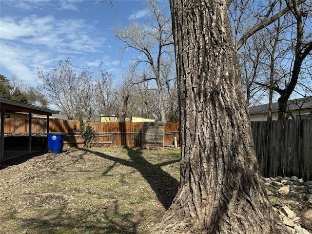 view of yard with a fenced backyard