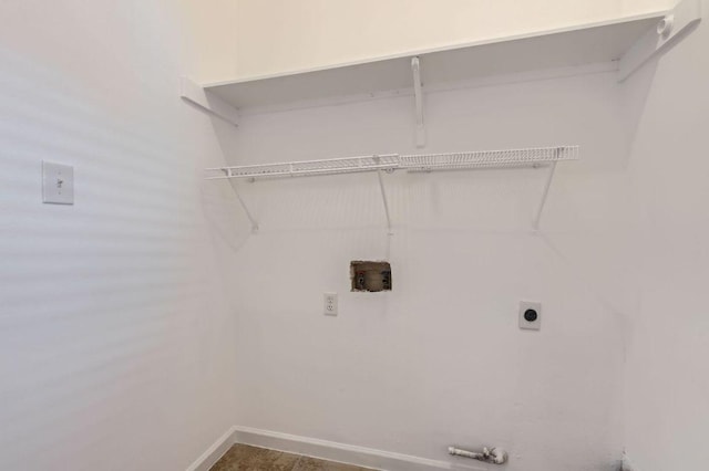 laundry room with baseboards, hookup for an electric dryer, washer hookup, and laundry area