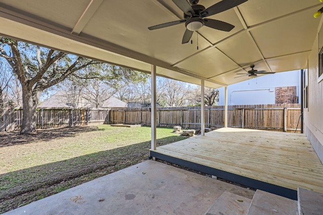 view of patio featuring a ceiling fan, a fenced backyard, and a wooden deck