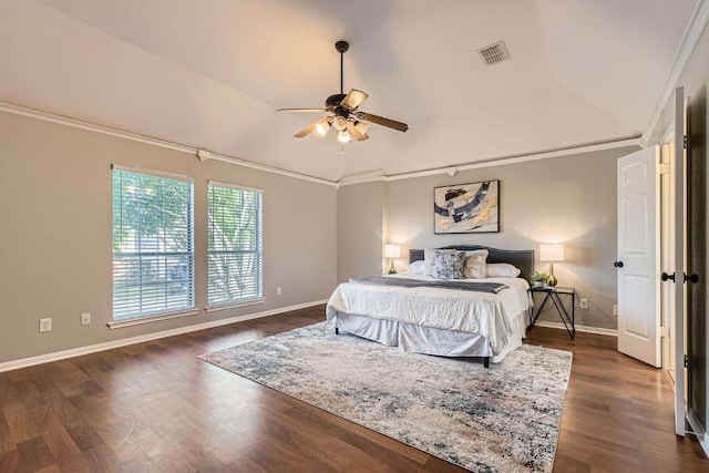 1703 Pecos Valley Cv, Round Rock, TX 78665 - bedroom featuring vaulted ceiling, ornamental molding, dark wood-type flooring, baseboards, and a ceiling fan