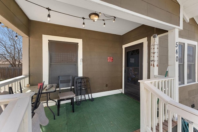 property entrance with covered porch