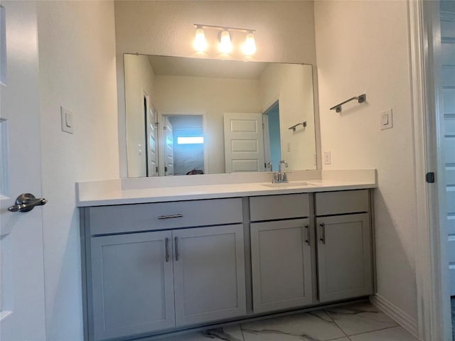 20425 Gillbrand Rd, Manor, TX 78653 - bathroom featuring marble look tiles and vanity